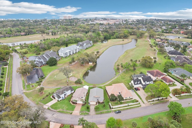 birds eye view of property featuring a water view and a residential view