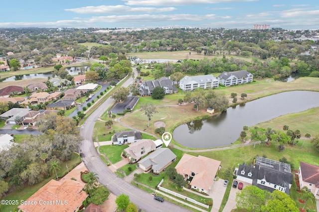 aerial view featuring a water view and a residential view