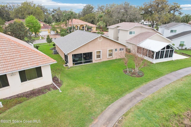 drone / aerial view with a residential view