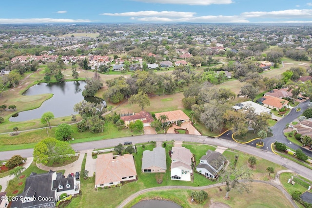 birds eye view of property with a residential view and a water view