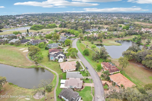 aerial view featuring a water view and a residential view