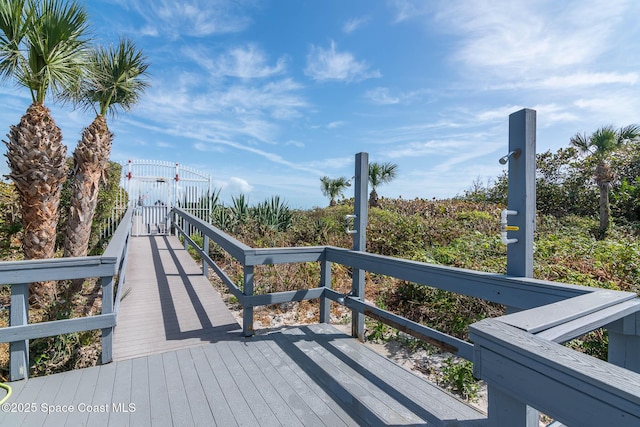 wooden deck with a gate