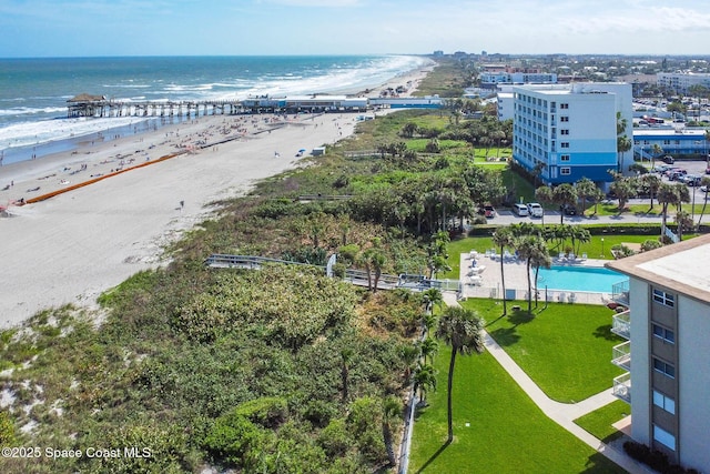 bird's eye view with a view of the beach and a water view