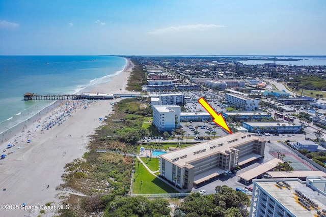 aerial view with a view of the beach and a water view