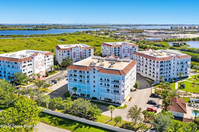 drone / aerial view featuring a water view