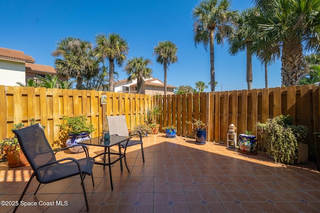 view of patio with a fenced backyard