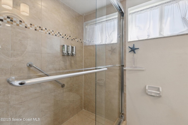 bathroom with a stall shower