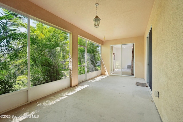 view of patio featuring a balcony