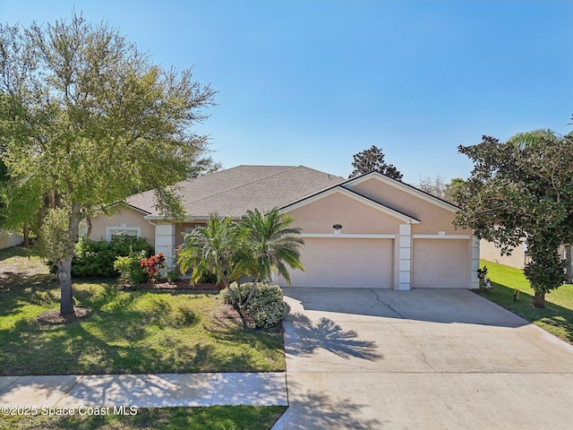 view of front of house with stucco siding, an attached garage, concrete driveway, and a front lawn