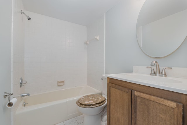 bathroom featuring vanity, bathing tub / shower combination, toilet, and tile patterned floors