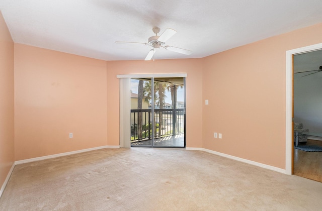 unfurnished room with ceiling fan, baseboards, and light colored carpet