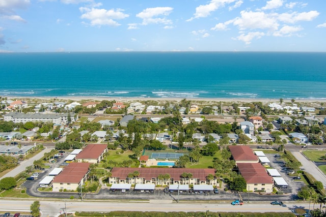 bird's eye view featuring a water view and a residential view