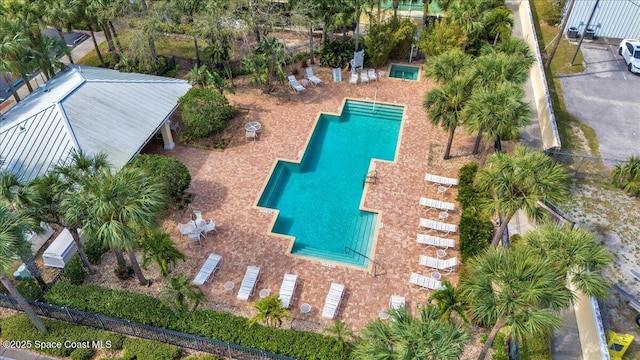 view of swimming pool featuring a patio area