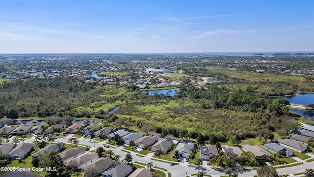 bird's eye view with a water view and a residential view