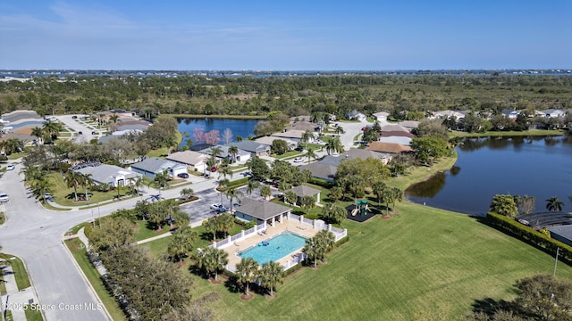 bird's eye view featuring a water view and a residential view