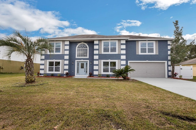 view of front of house with a garage, driveway, a front lawn, and stucco siding