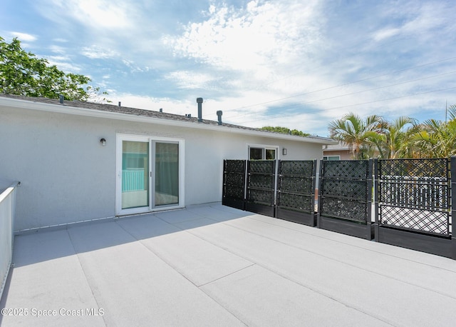 241 S Brevard Ave, Cocoa Beach, FL 32931 - view of patio / terrace with a gate and fence