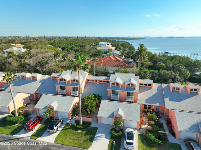 aerial view with a water view and a residential view