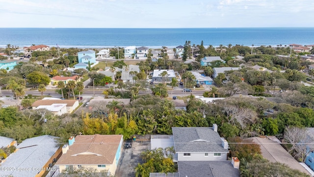 bird's eye view featuring a water view and a residential view