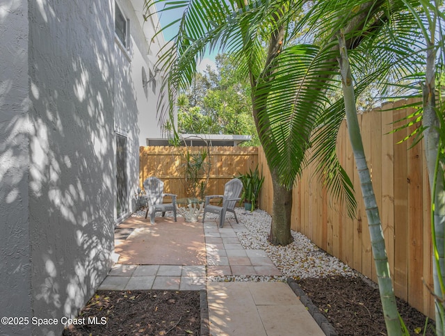 view of patio featuring a fenced backyard