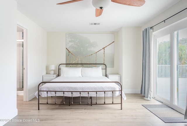 bedroom featuring light wood finished floors, access to outside, visible vents, and baseboards