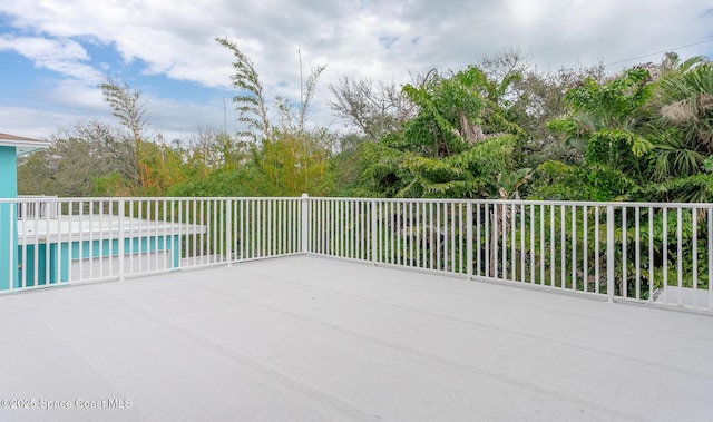 view of patio / terrace featuring a fenced in pool