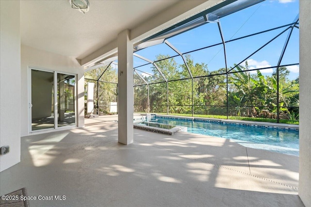 pool with a lanai and a patio