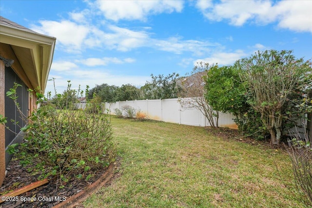 view of yard featuring a fenced backyard