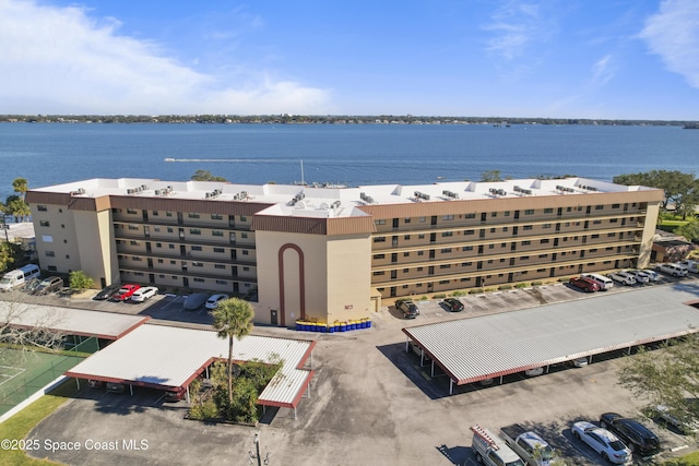 drone / aerial view with a water view