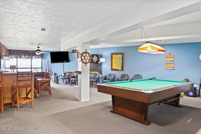 playroom featuring carpet floors, billiards, a ceiling fan, and a textured ceiling