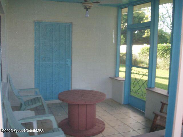 sunroom featuring a healthy amount of sunlight