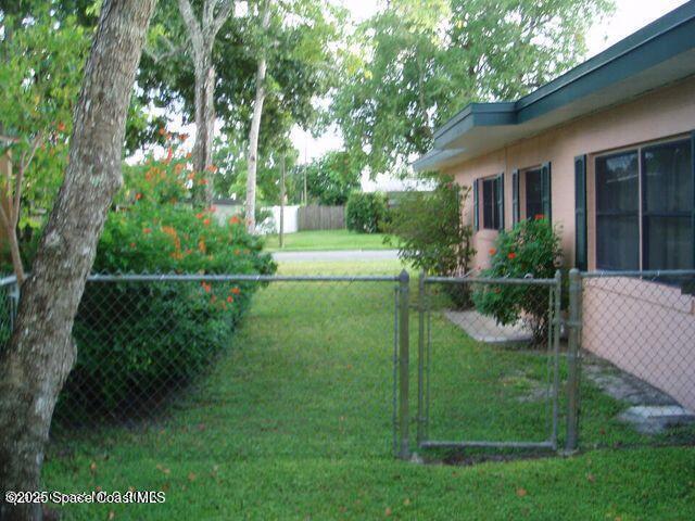 view of yard with fence