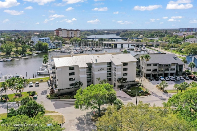 drone / aerial view featuring a water view