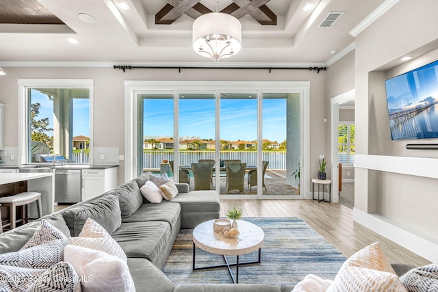 living room featuring visible vents, coffered ceiling, recessed lighting, light wood-style floors, and crown molding