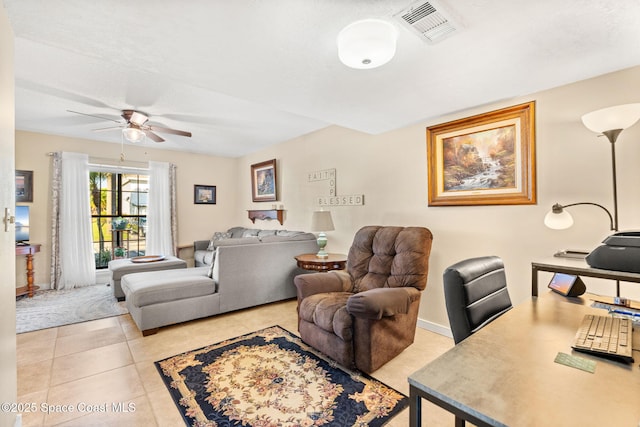 living area featuring light tile patterned floors, ceiling fan, and visible vents