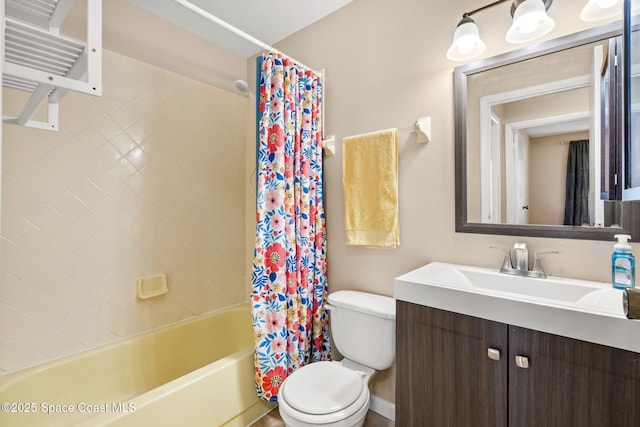 bathroom featuring shower / bathtub combination with curtain, toilet, and vanity