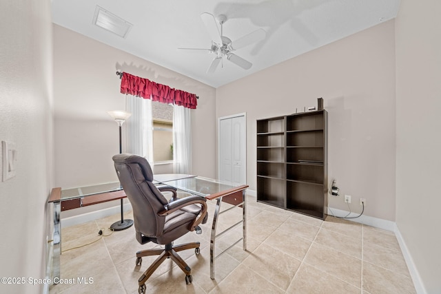 office area with light tile patterned floors, visible vents, baseboards, and a ceiling fan