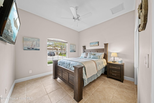 bedroom with visible vents, baseboards, a ceiling fan, and light tile patterned flooring