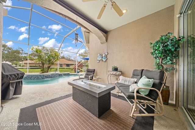 exterior space with a fire pit, area for grilling, a lanai, and an outdoor pool