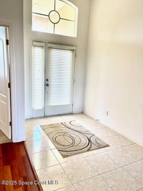 1401 Rila St SE, Palm Bay, FL 32909 - foyer featuring tile patterned flooring