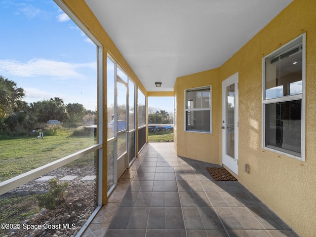 view of unfurnished sunroom