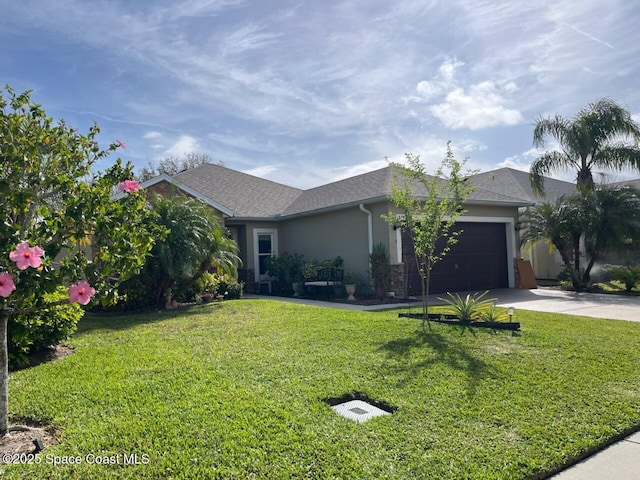 ranch-style house with stucco siding, a garage, concrete driveway, and a front lawn