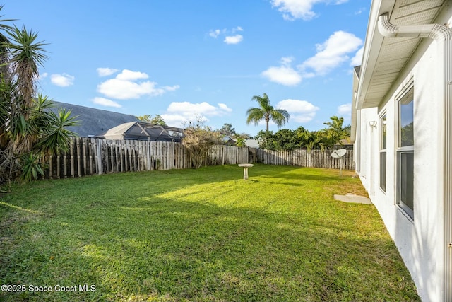 view of yard featuring a fenced backyard