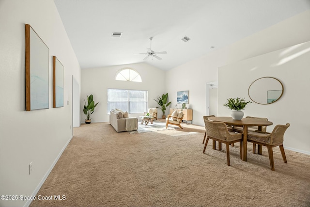 interior space with high vaulted ceiling, visible vents, baseboards, and a ceiling fan