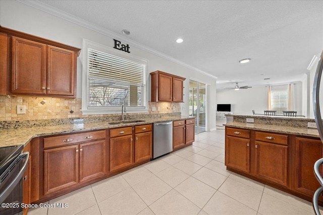 kitchen with stainless steel dishwasher, a sink, light stone counters, and crown molding