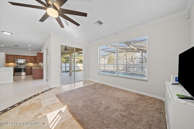 unfurnished living room featuring recessed lighting, visible vents, crown molding, and baseboards