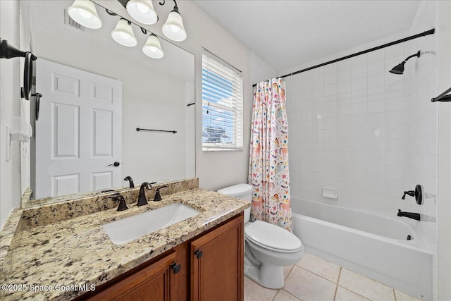 full bathroom featuring toilet, visible vents, vanity, tile patterned floors, and shower / bath combo