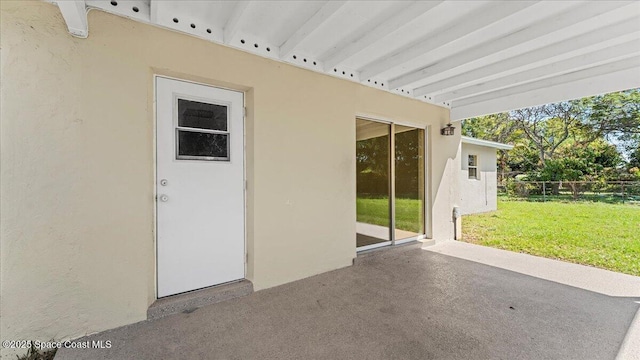 view of patio featuring fence