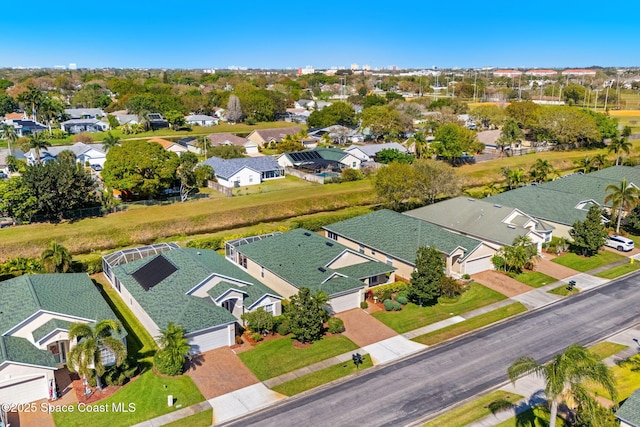 drone / aerial view with a residential view