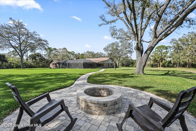 view of patio / terrace with a fire pit